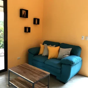 couch and table at rent house costa rica