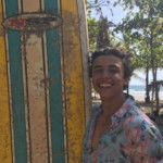 Keep that smile, wherever you go!! A jordan young men with a surfboard
