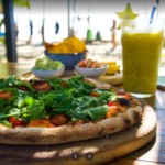 Pizza and a healthy beverage at Restaurant El Carmen Restaurant El Carmen in Santa Teresa Beach